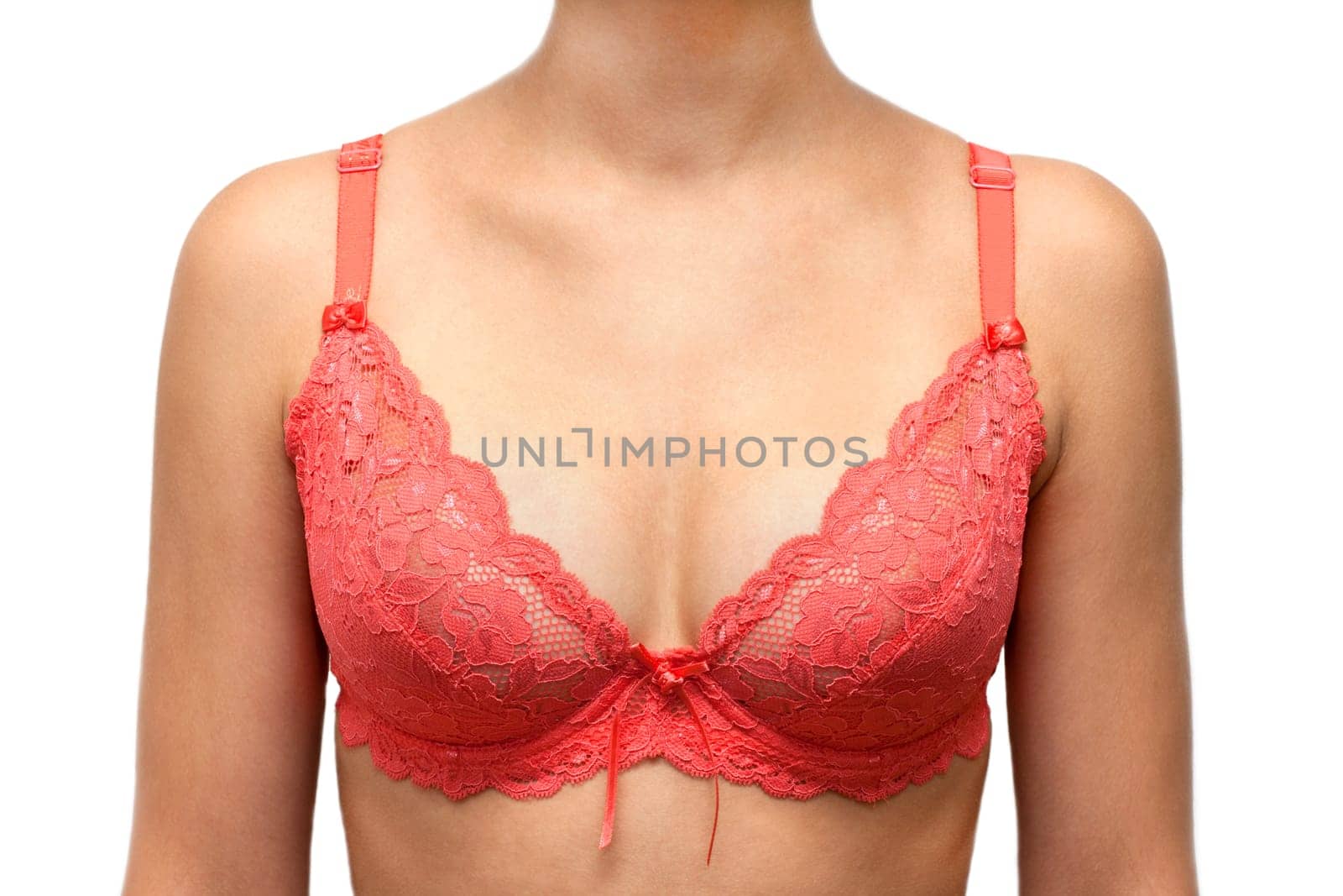 Bust of the young girl in red bra on white background