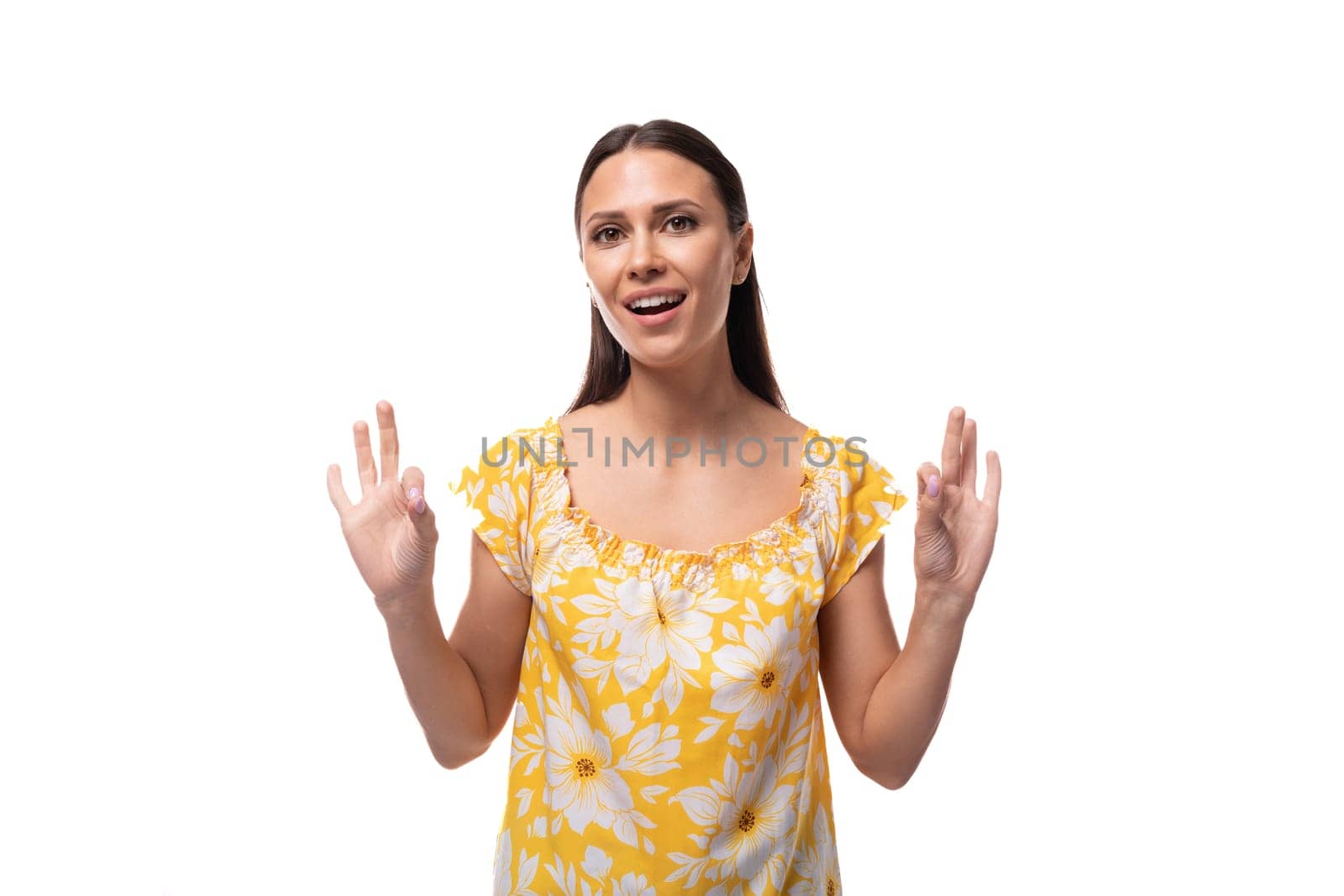 brunette young woman dressed in summer outfit smiling cute on white background.