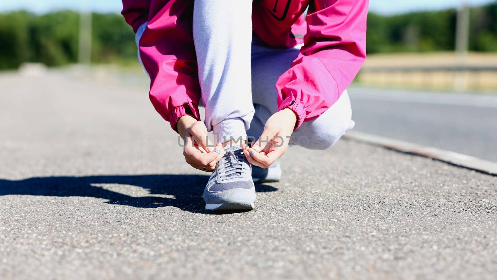 Minsk, Belarus - July 25, 2023 : Woman walking with Adidas shoes Illustrative editorial