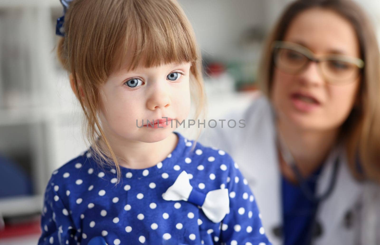 Little child with mother at pediatrician reception. Physical exam cute infant portrait baby aid healthy lifestyle ward round child sickness clinic test high quality and baby concept