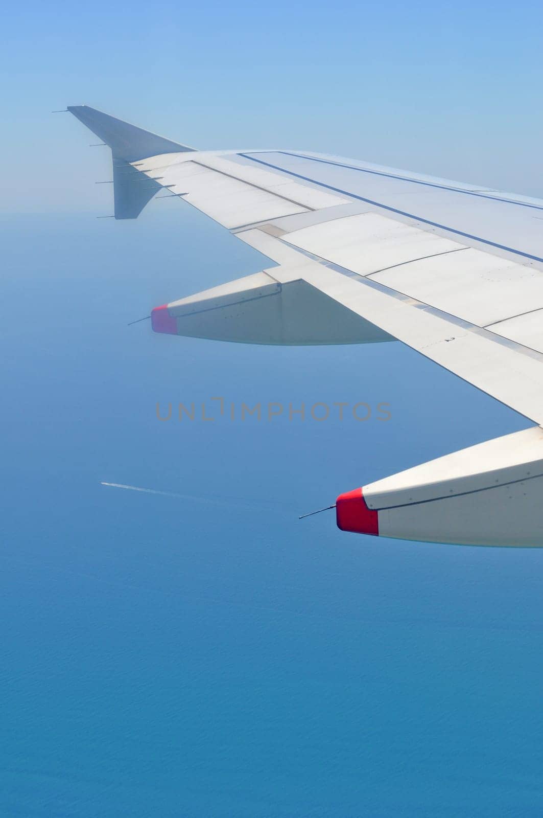 Aerial view from a flying plane in the sky
