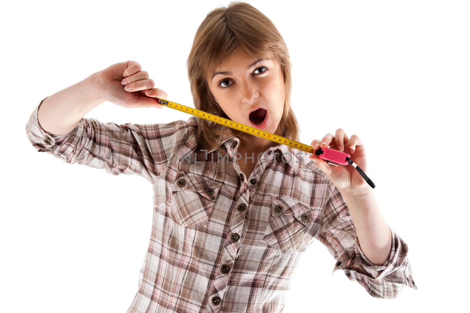 Young beautiful girl with tape measure on white background