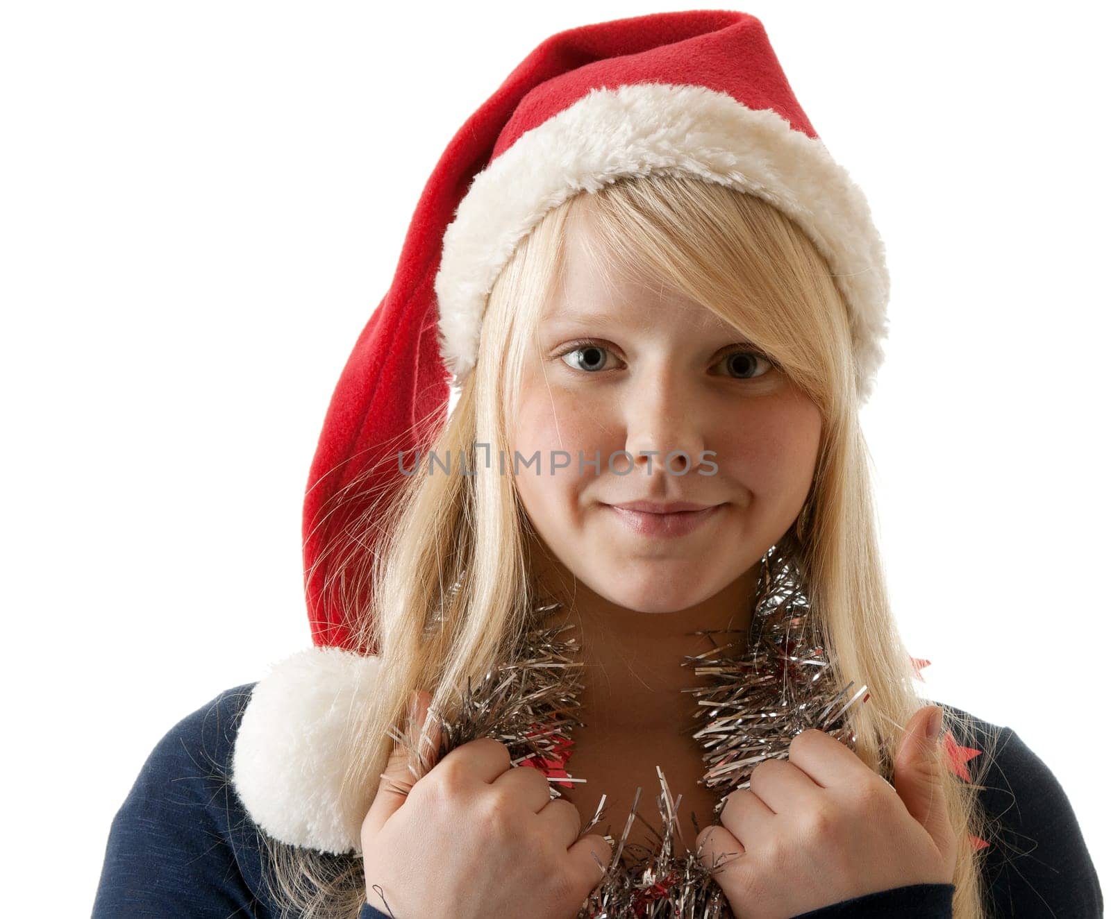 A beautiful young blonde in a Santa hat on a white background