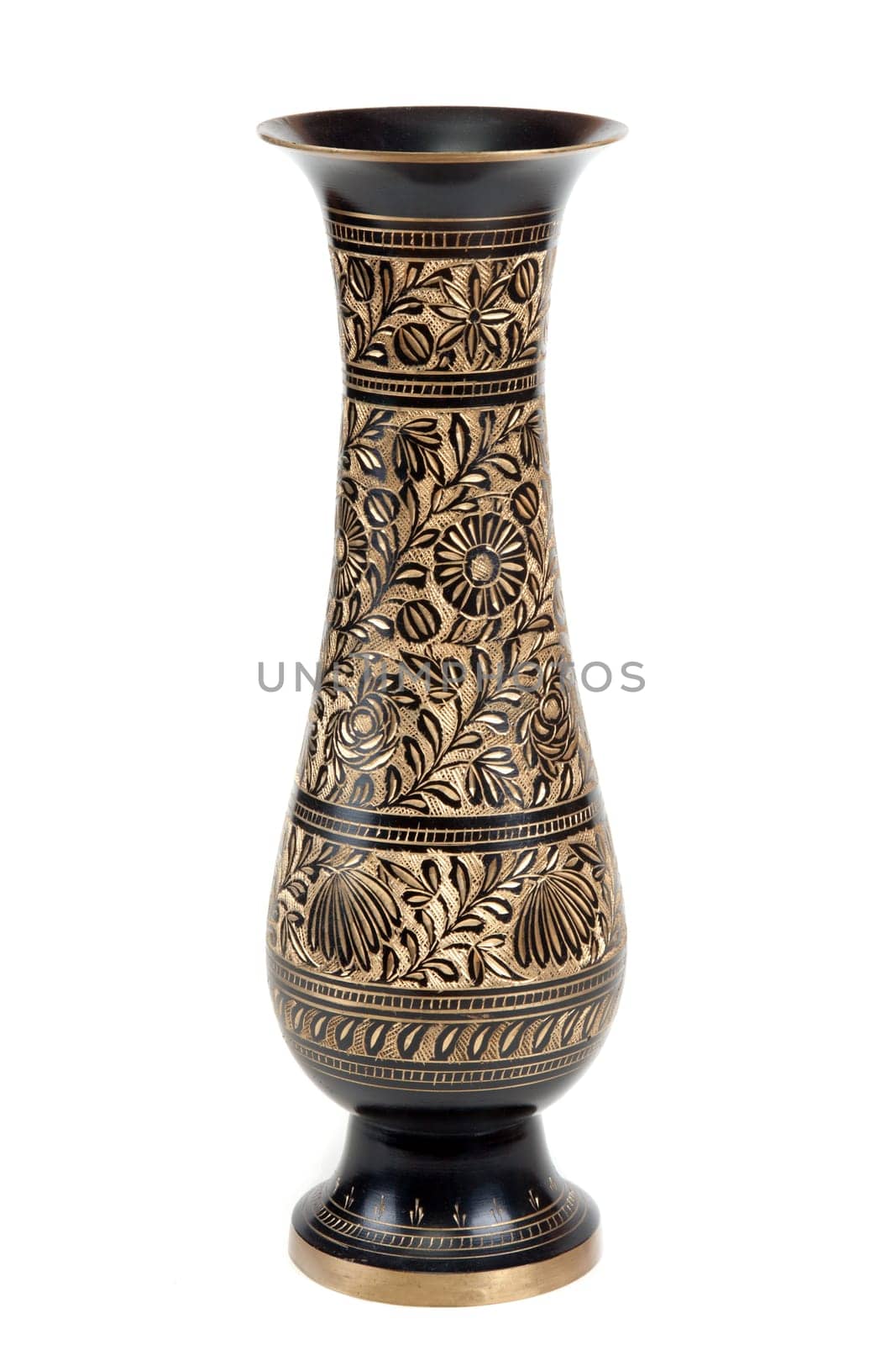 Brass vase with pattern on white background