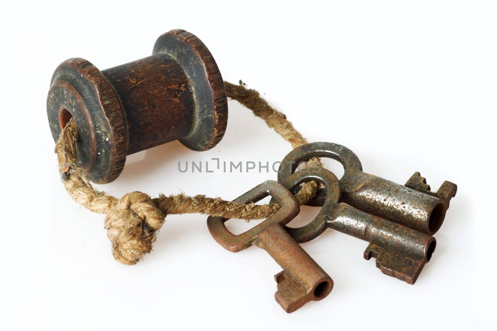 Antique key bundle on white background