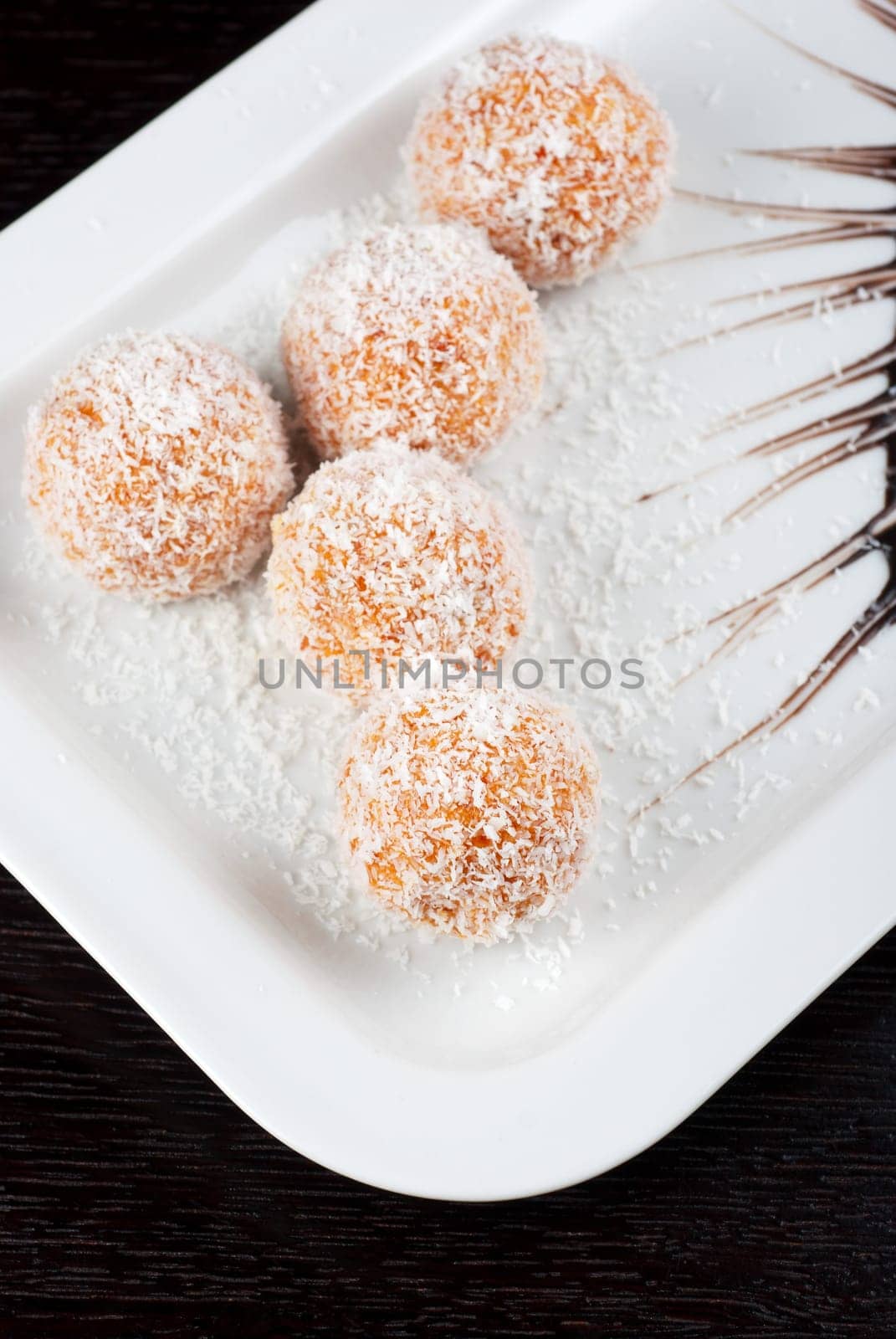 fresh baked cupcake closeup on a white plate