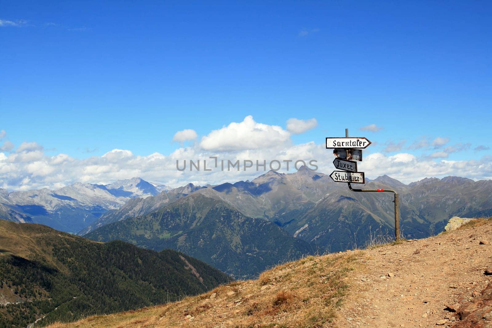 Old signpost on the summit at the Penserjoch