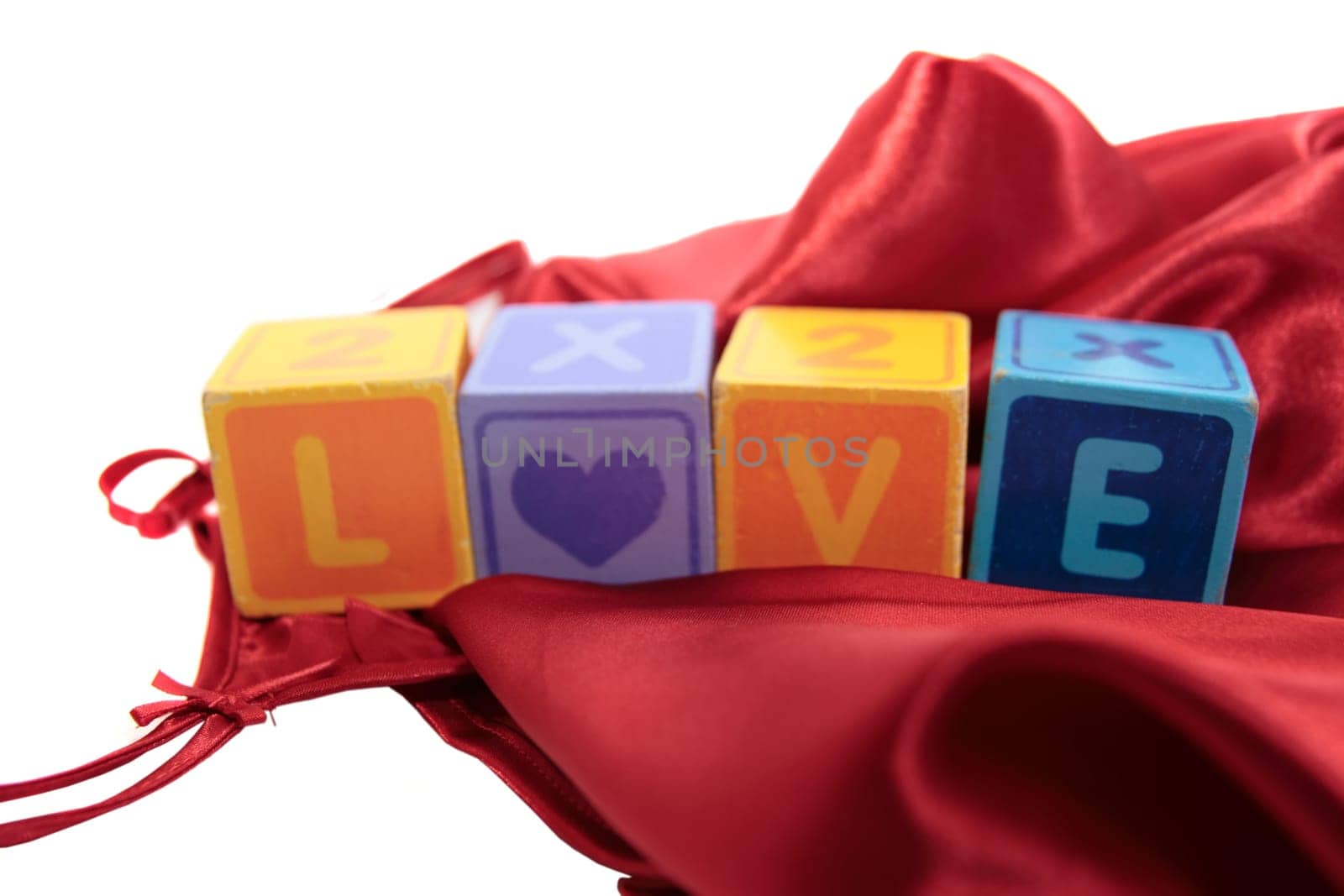 love written with blocks on a silk nightie