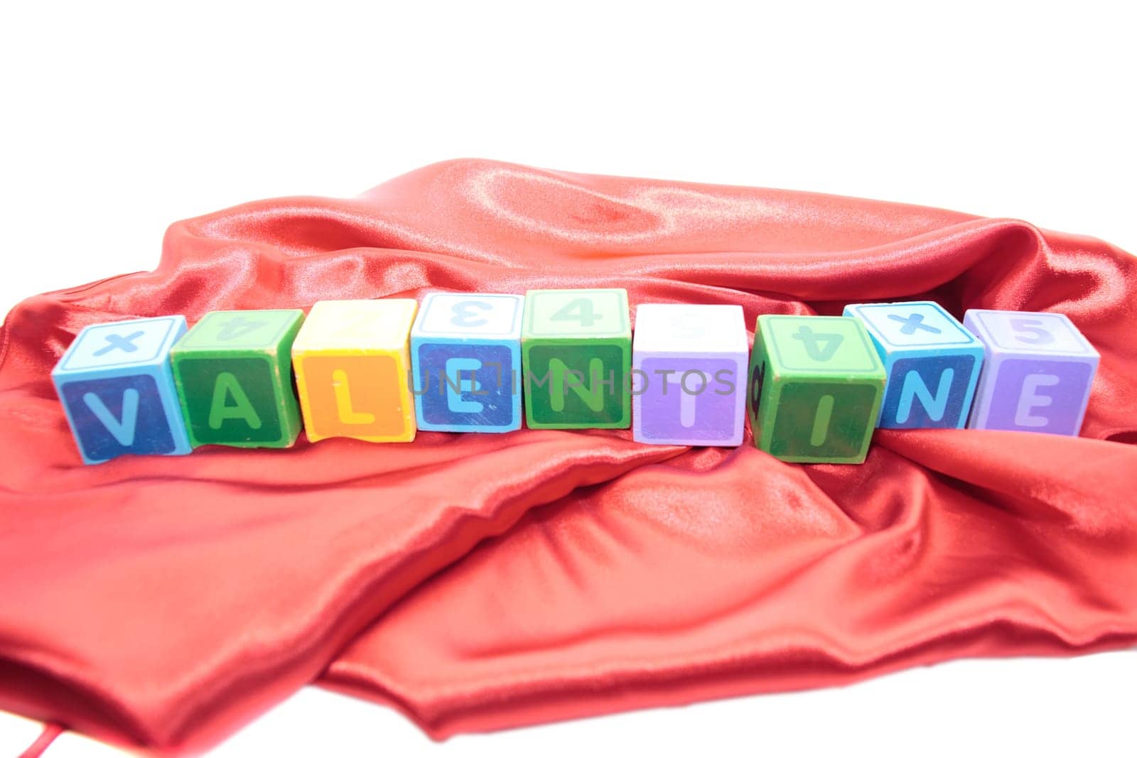 valentines written with blocks on a silk nightie