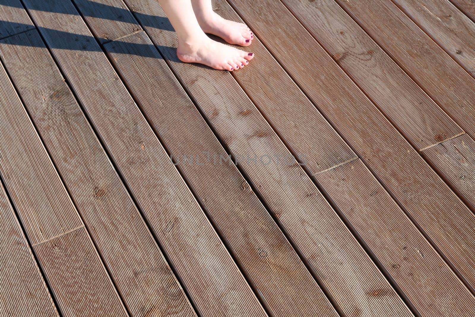 Warm feet on a wooden floor