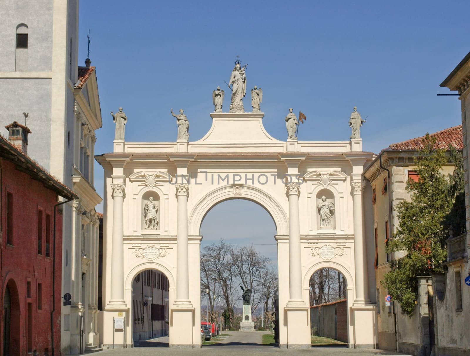 The old baroque city gate in Cherasco, Piedmont, Italy