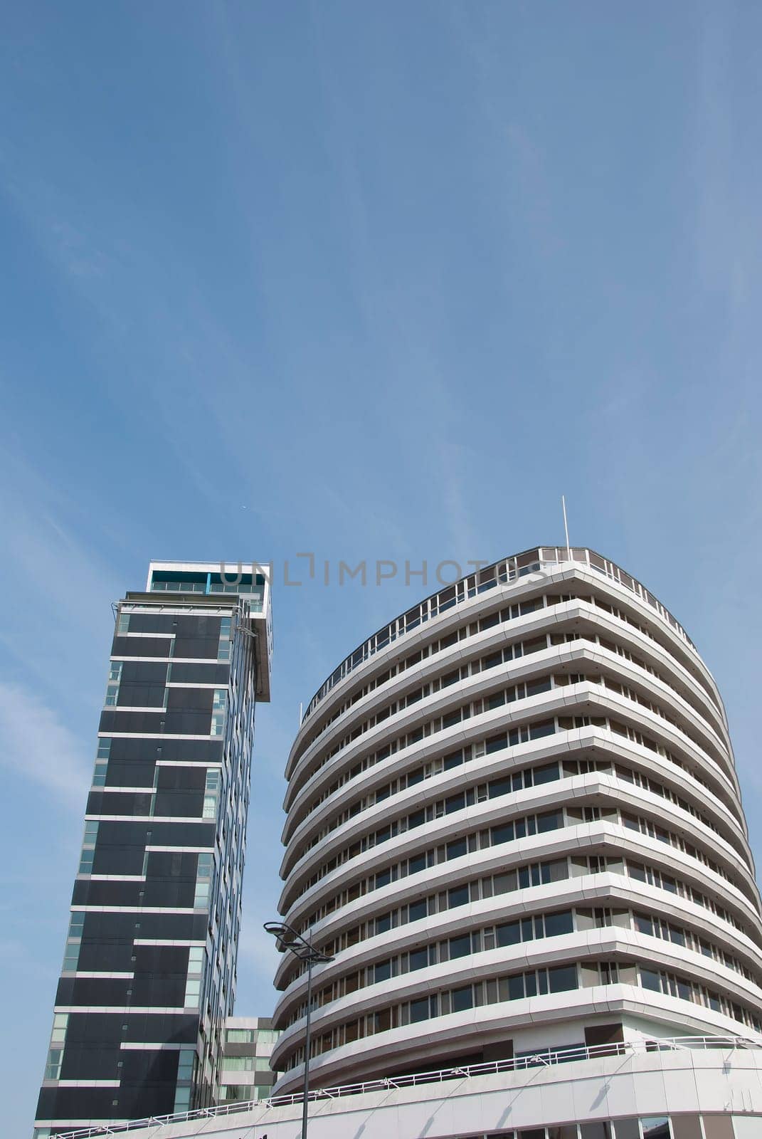 Stylish Unusual Apartment Blocks under a blue sky