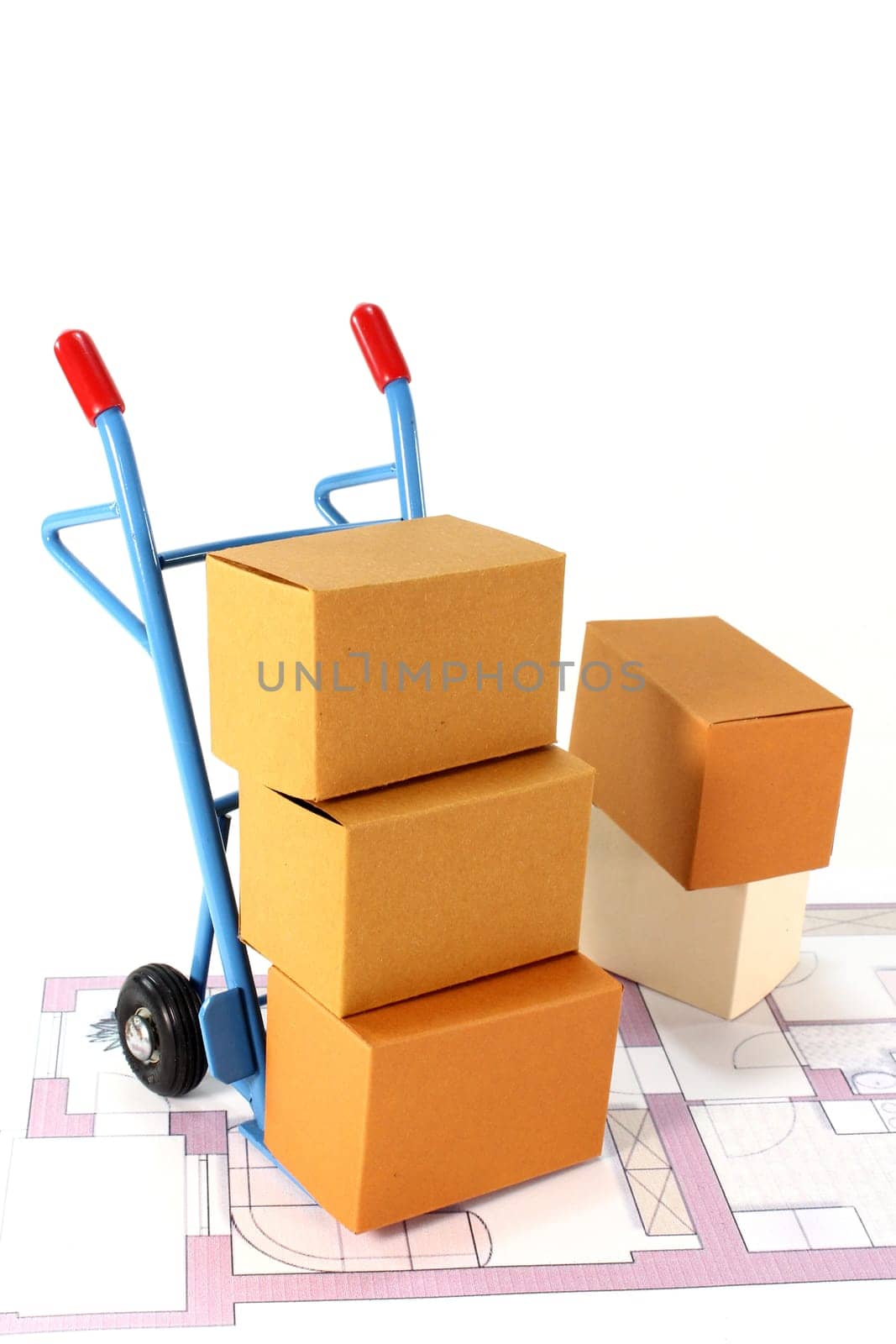 a sack truck and moving boxes against a white background