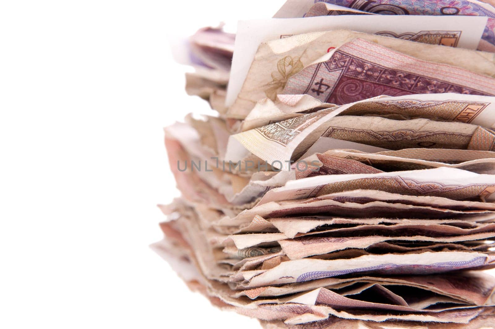 Stack of Chinese currency close-up isolated on the white