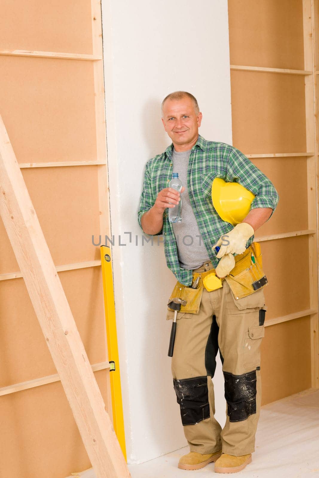 Handyman mature professional diy home improvement relax drink water