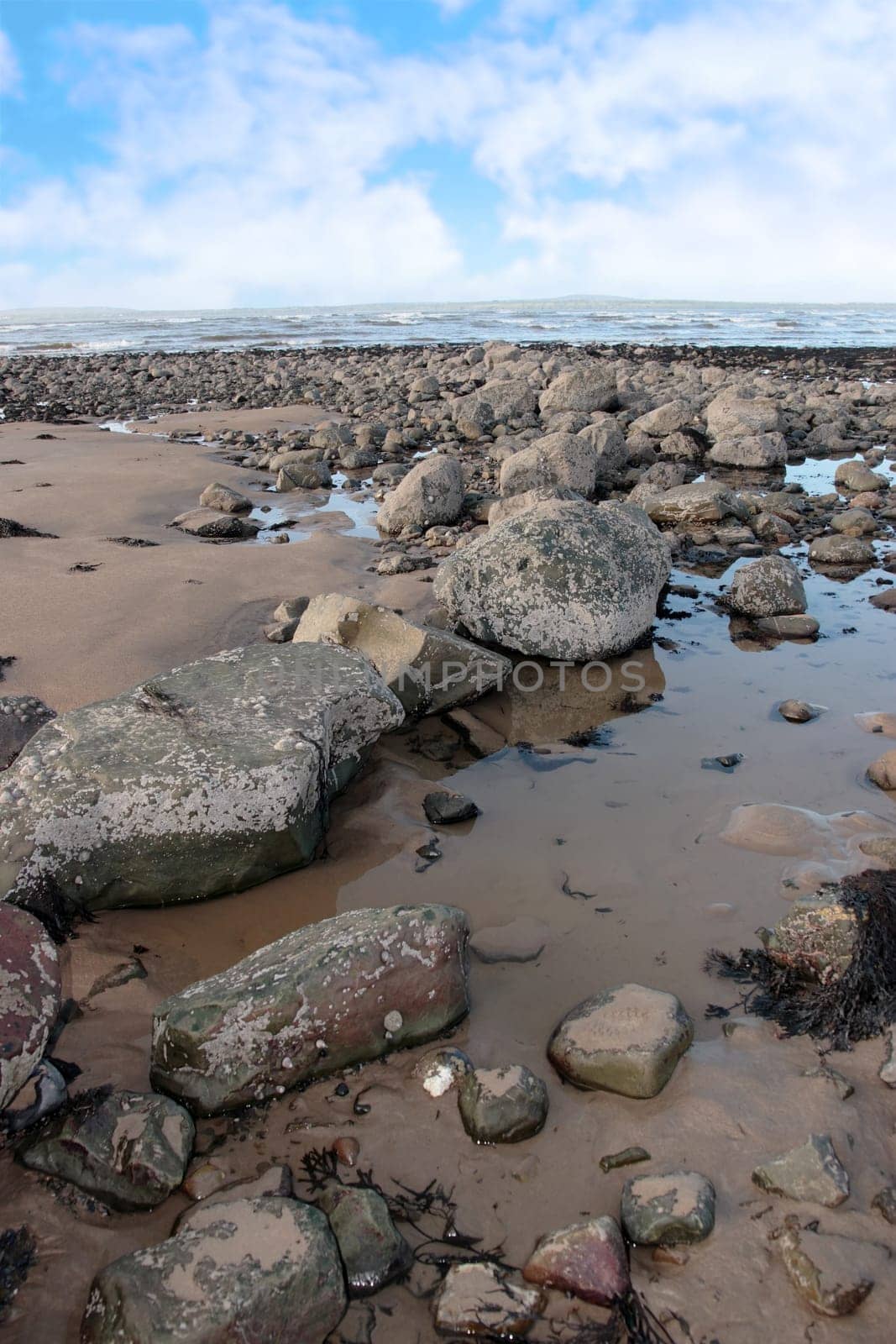 rocks on beale beach co kerry ireland on a cold winters day