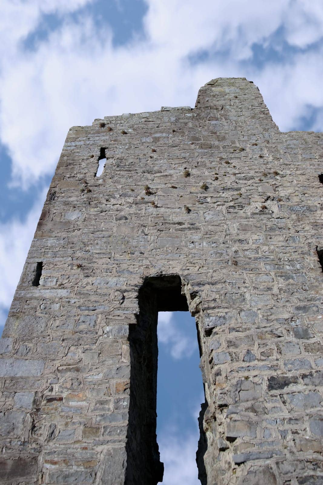 closeup of the old ruins of a castle in ballybunion