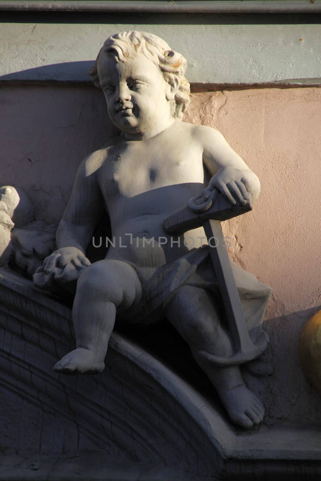 Angel on a house in Mühlhausen