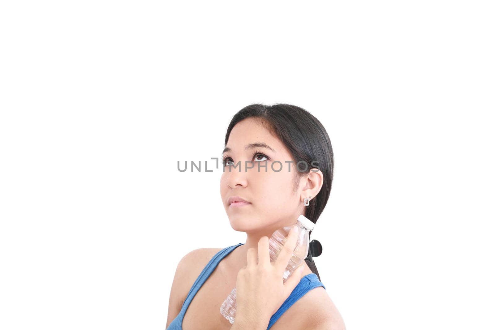 female holding in hand sparkling mineral bottled water isolated on a white background