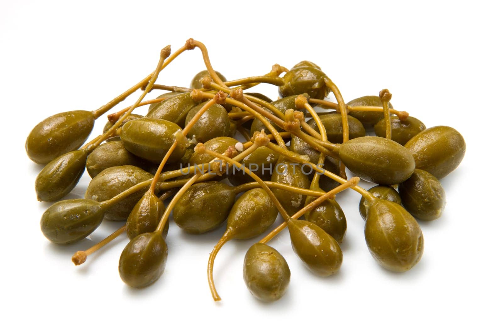 caperberries close up on white background