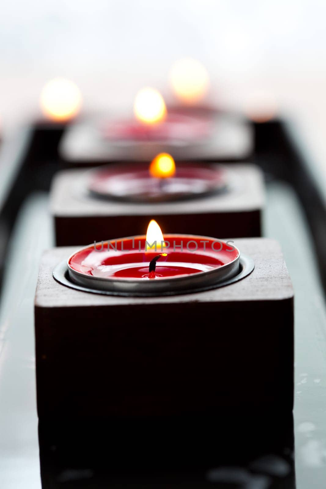 Close-up of red tea-light candles for Christmas