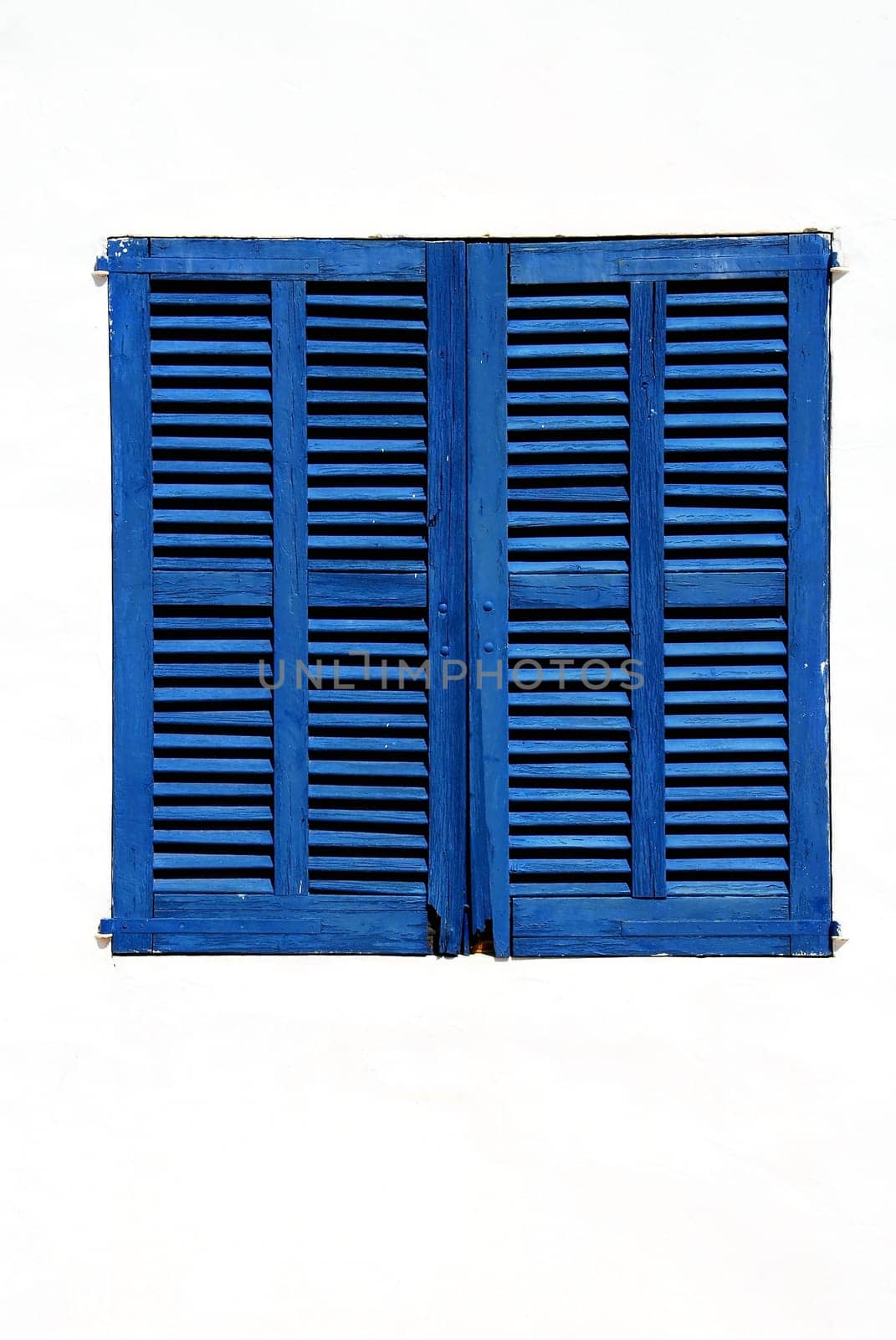 The blue wooden shutters