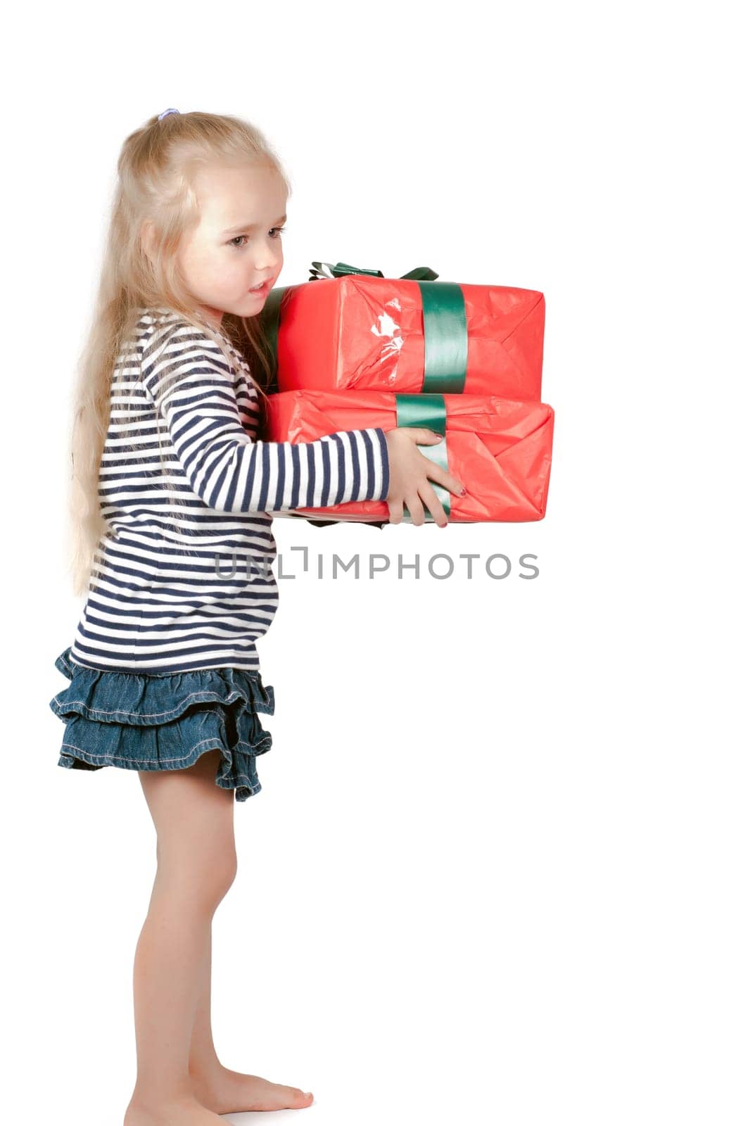 Shot of little cute girl with long hair in studio