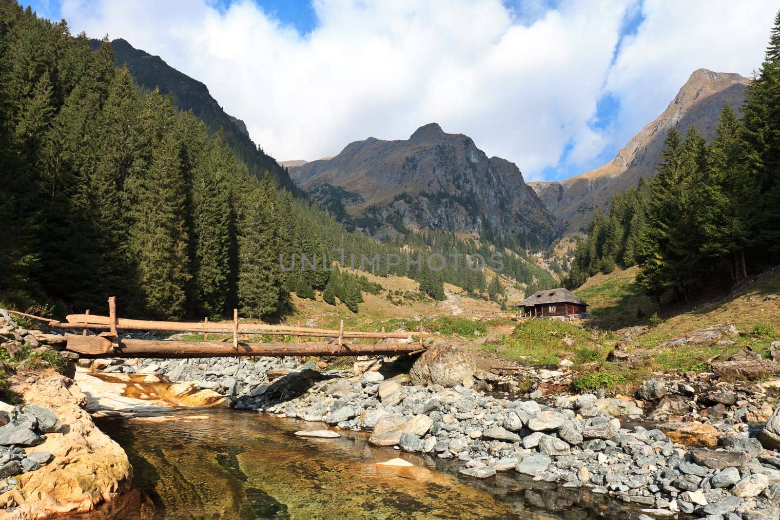 a rustic house near a big mountain