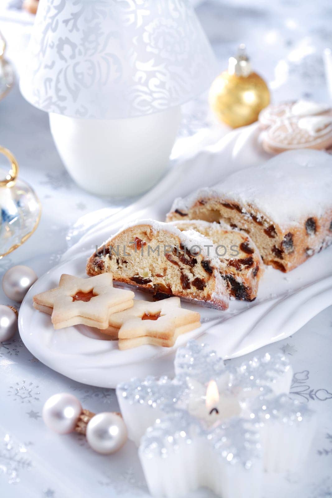 Still life with delicious Christmas cake and cookies