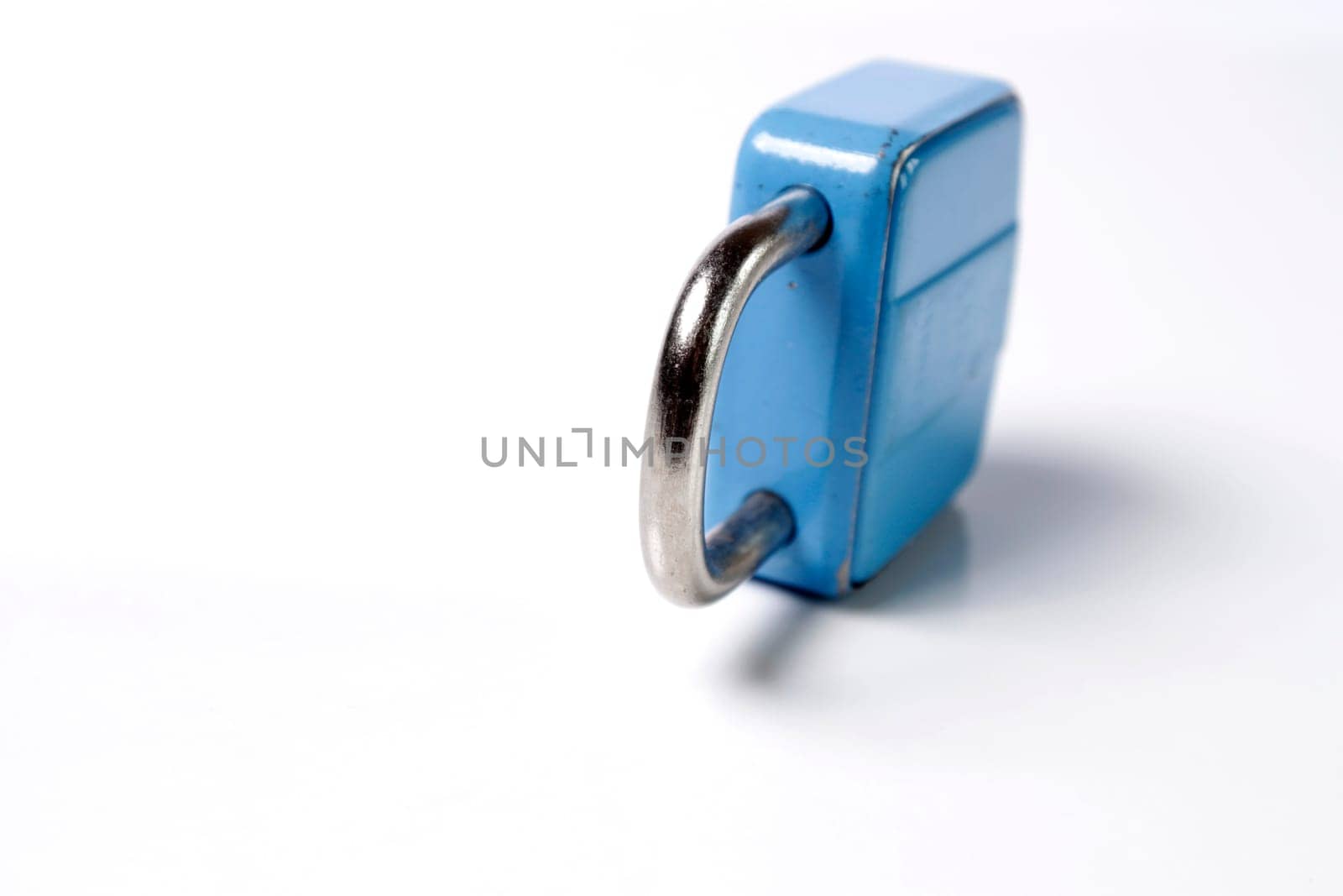 Old padlock on white background