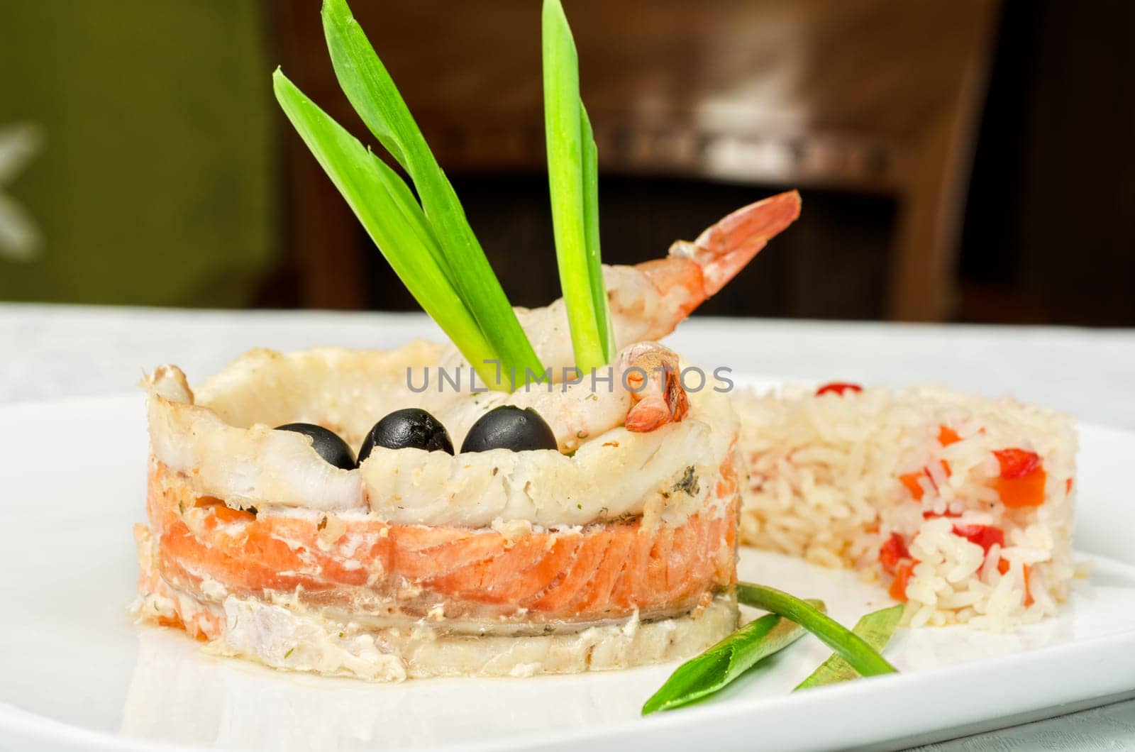 tasty prepared fish with rice and vegetables