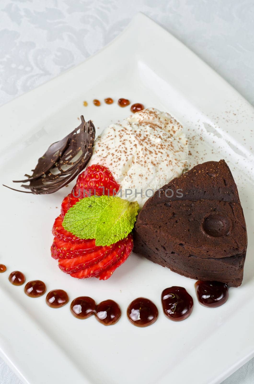 Chocolate flan with strawberries and chocolate, a wonderful dessert