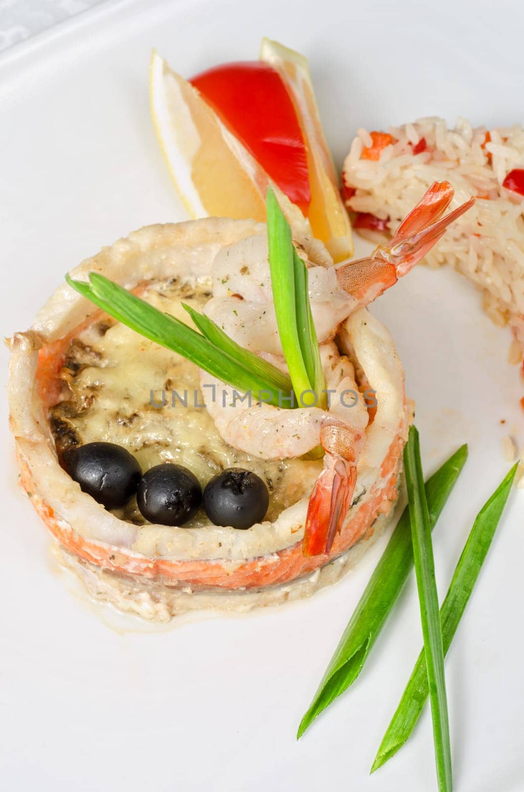 tasty prepared fish with rice and vegetables