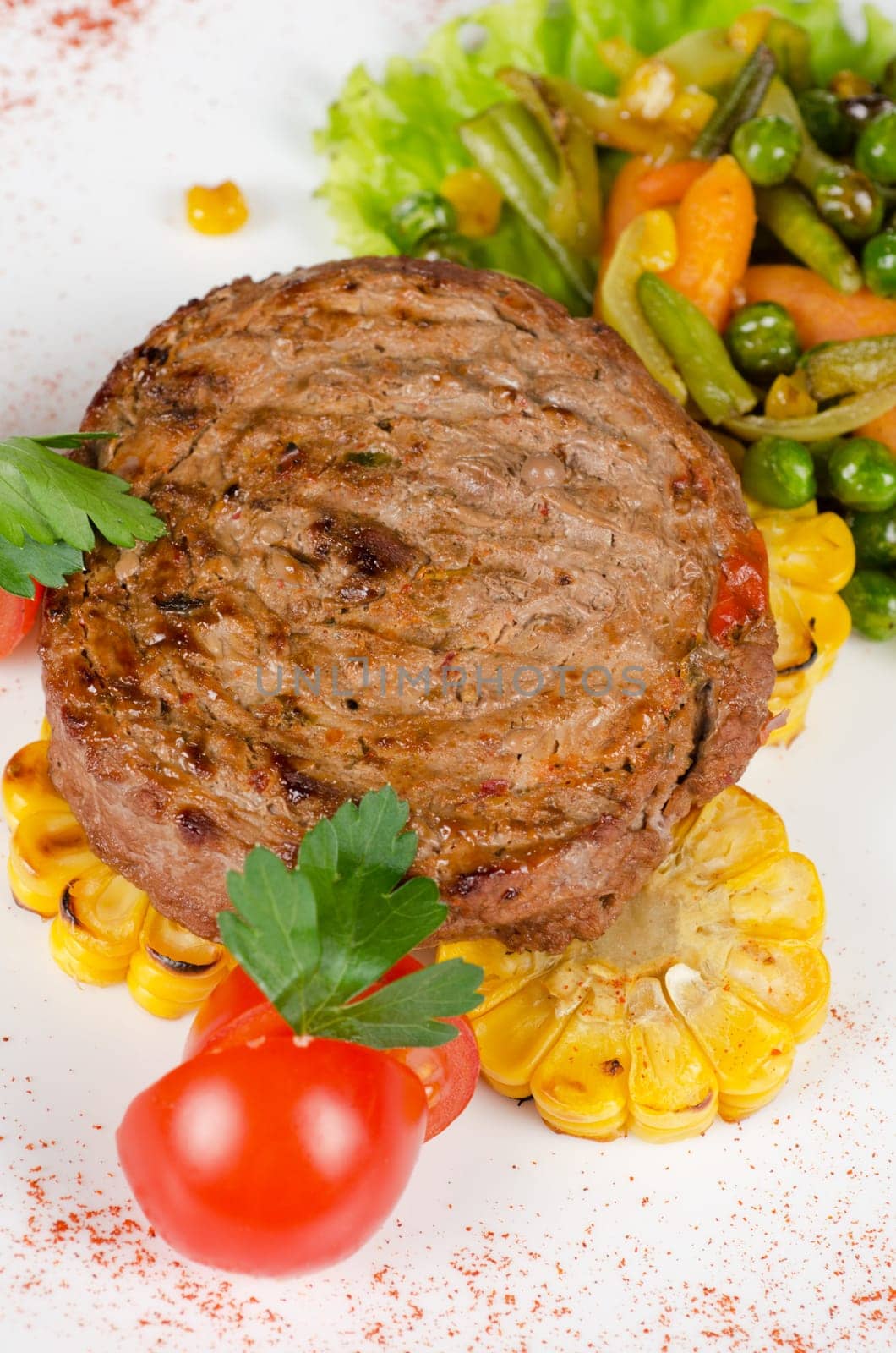 BBQ meat steak with vegetables and greens