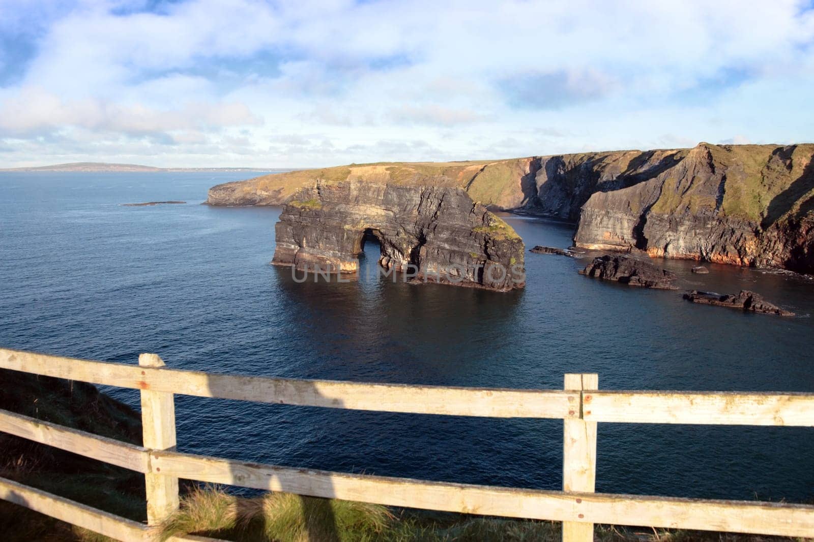 a view of the virgin rock in ballybunion ireland as seen from the cliffs on a calm winters day