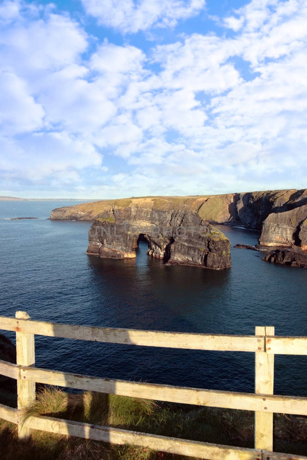 a view of the virgin rock in ballybunion ireland as seen from the cliffs on a calm winters day