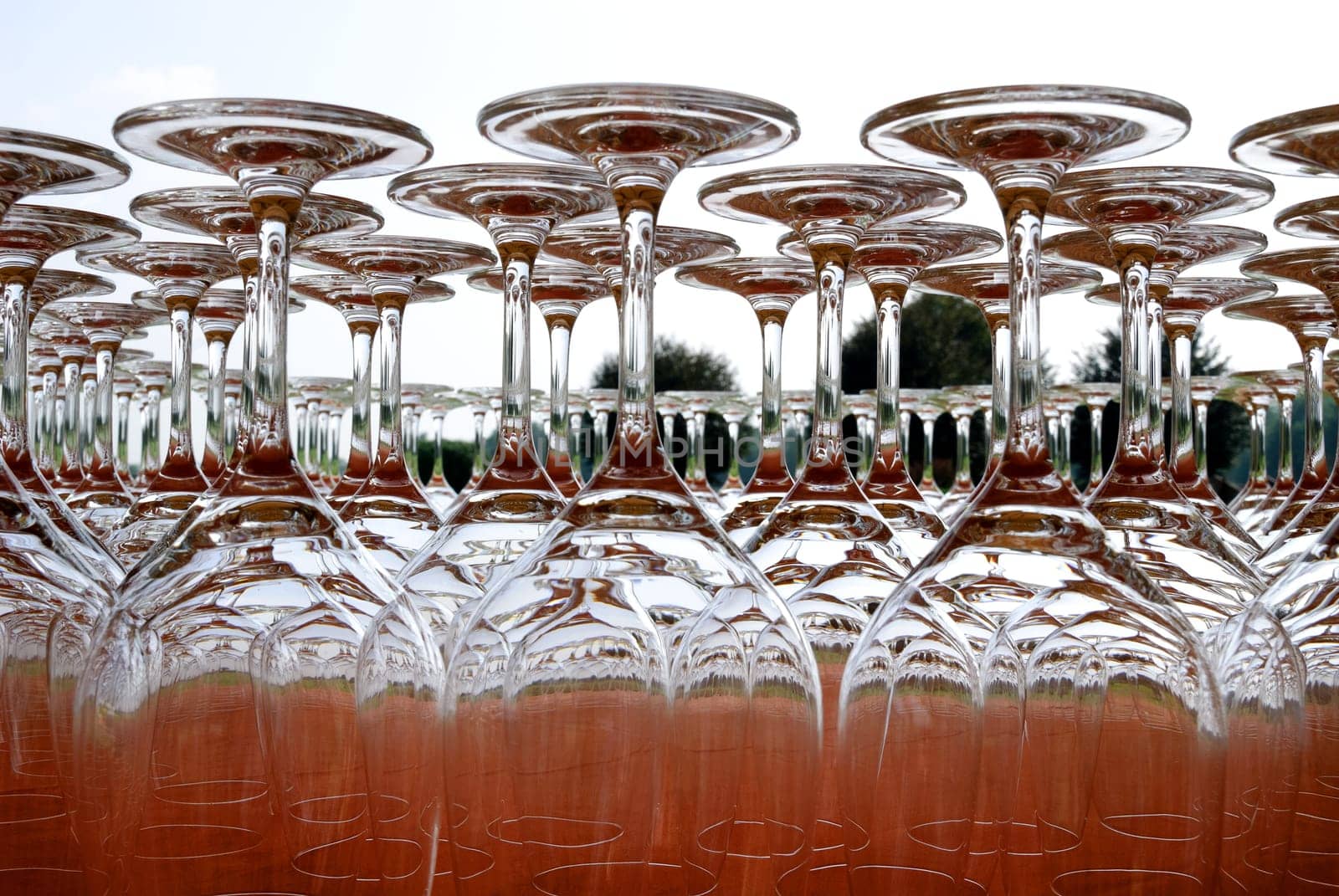 glasses upside down on a red tablecloth