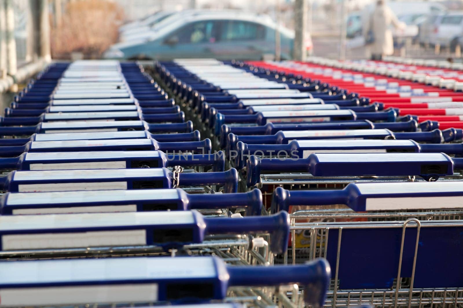 Row of empty shopping carts at the supermarket