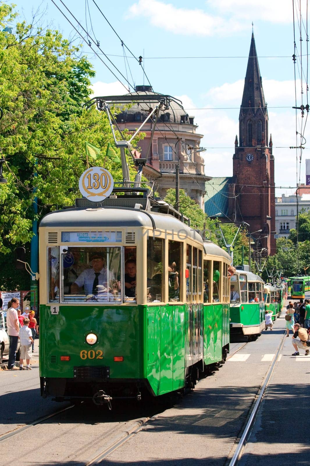 POZNAN, POLAND - JUNE 26, 2010 celebration of the 130th anniversary of MPK Poznan sp. z o.o. combined with a solemn parade of the vehicles. Both buses and tramways were put in ordered cue from the oldest to the newest starting from the horse tramway (1880