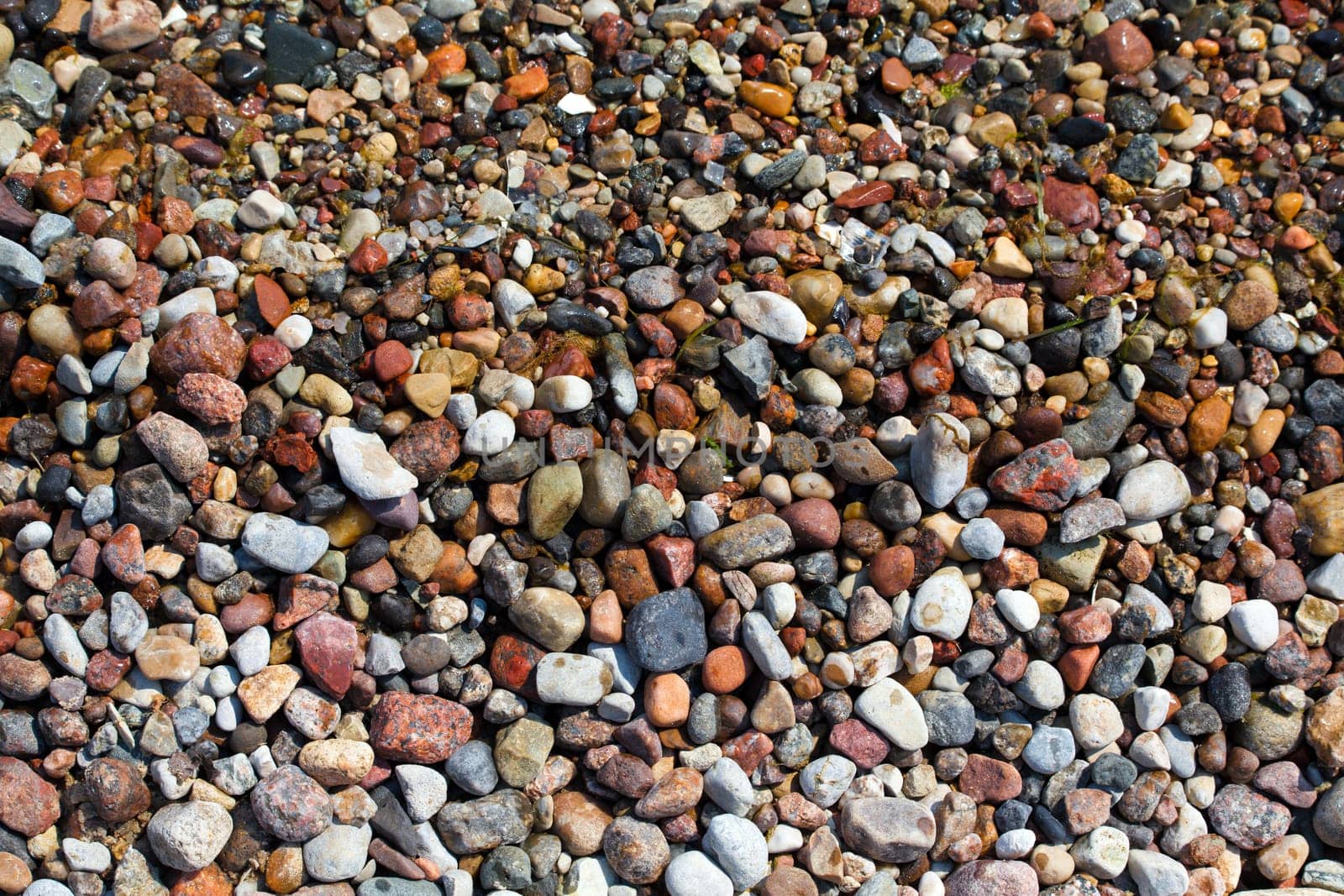 Close up of rounded and polished beach rocks