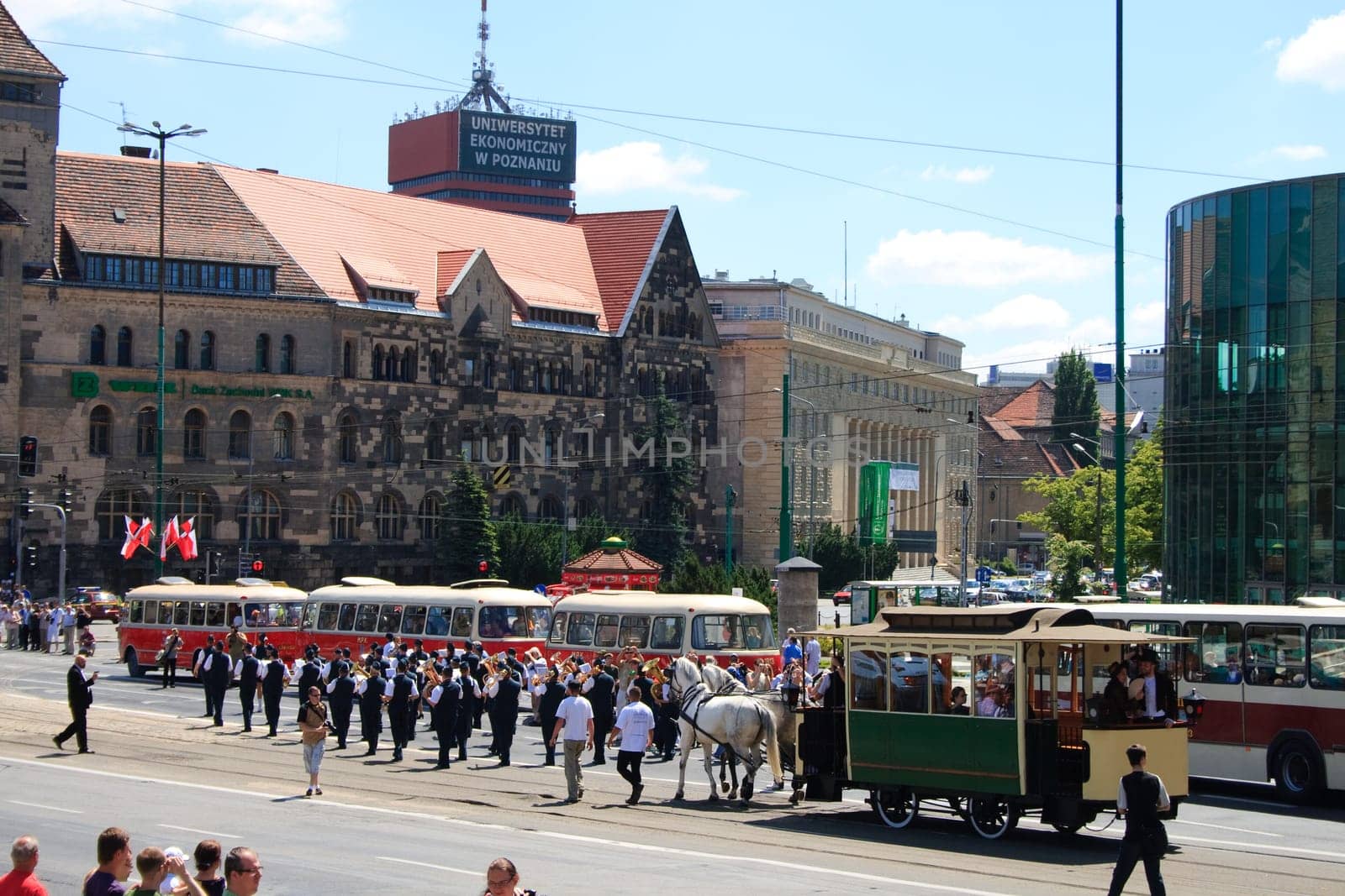 POZNAN, POLAND - JUNE 26, 2010 celebration of the 130th anniversary of MPK Poznan sp. z o.o. combined with a solemn parade of the vehicles. Both buses and tramways were put in ordered cue from the oldest to the newest starting from the horse tramway (1880