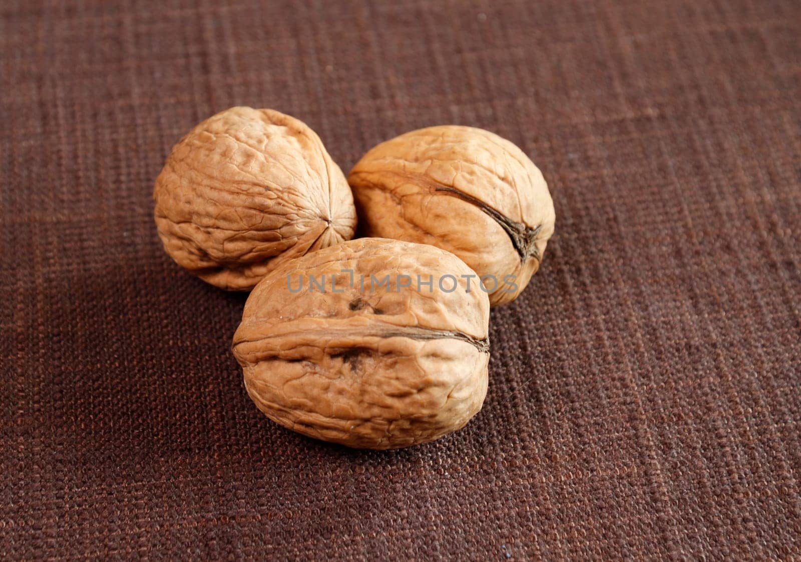Three walnuts with copy space