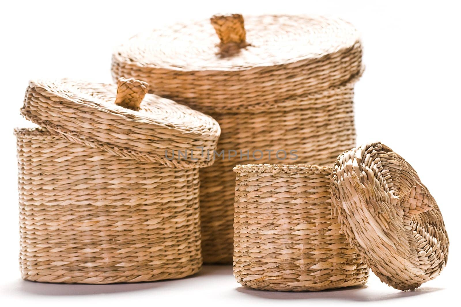 Brown baskets isolated on bright white background
