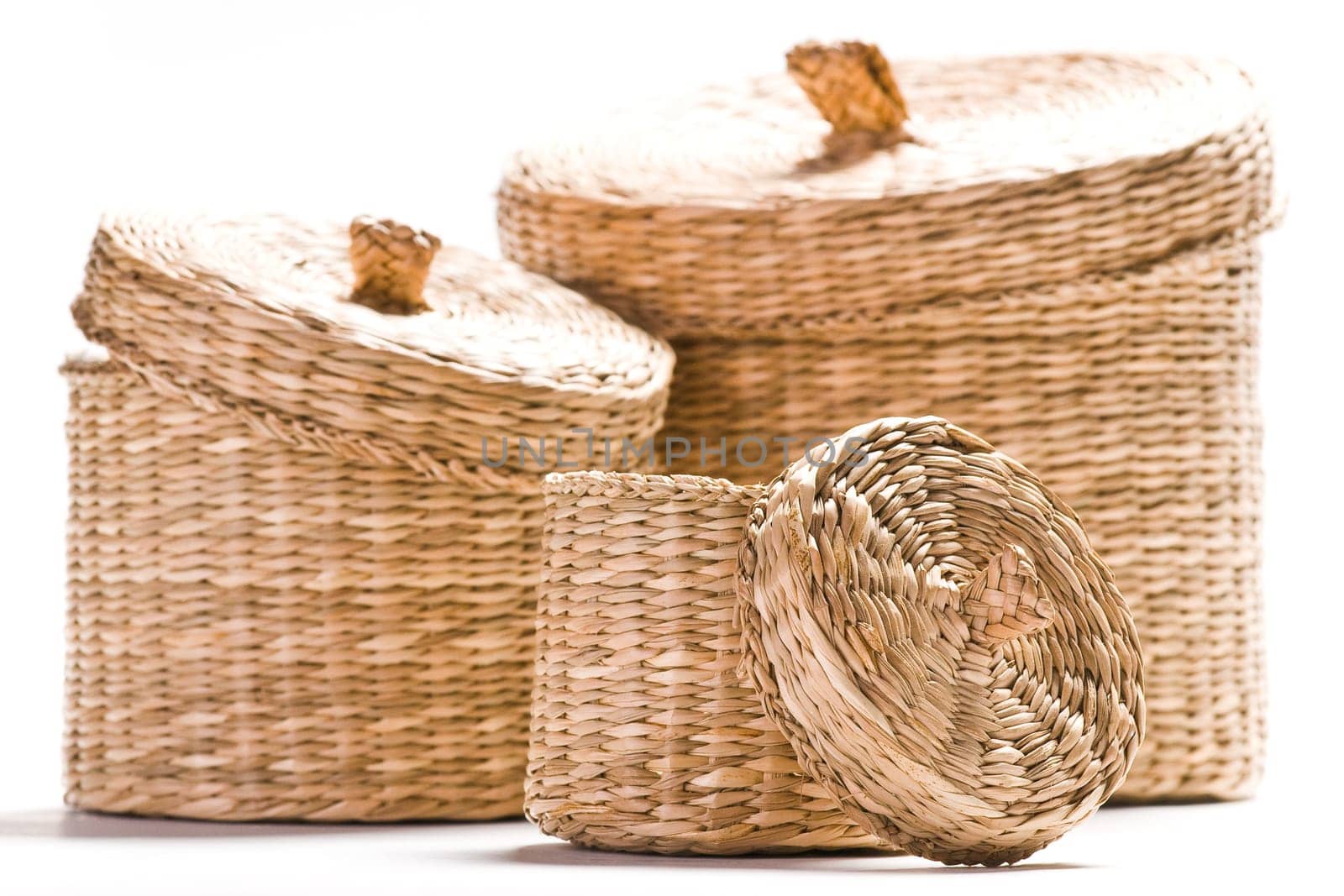 Brown baskets isolated on bright white background