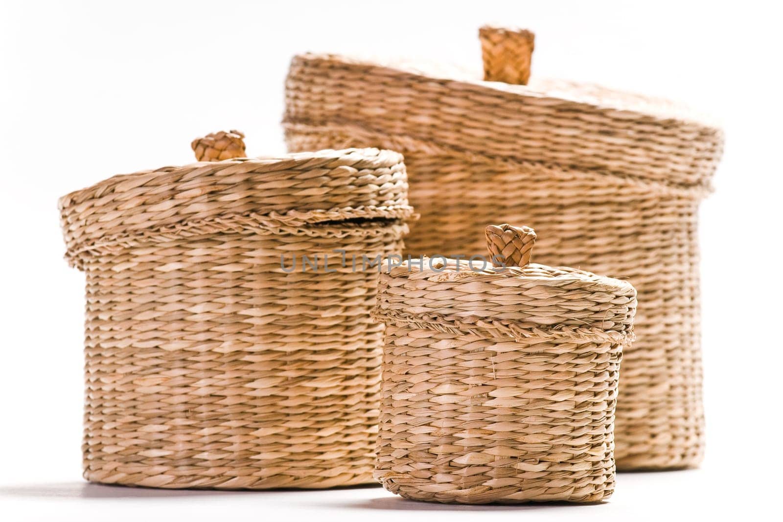 Brown baskets isolated on bright white background