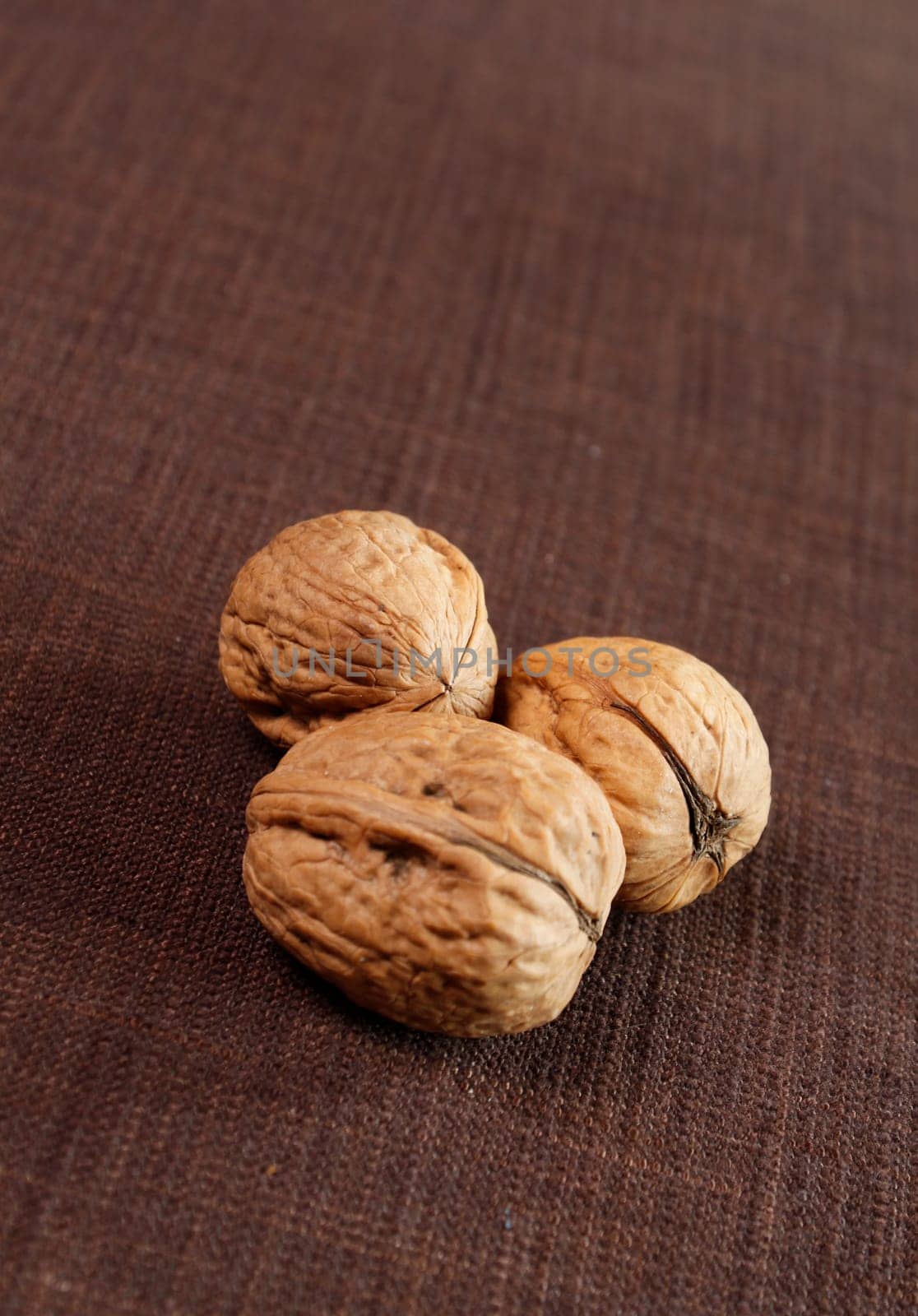 Three walnuts with copy space