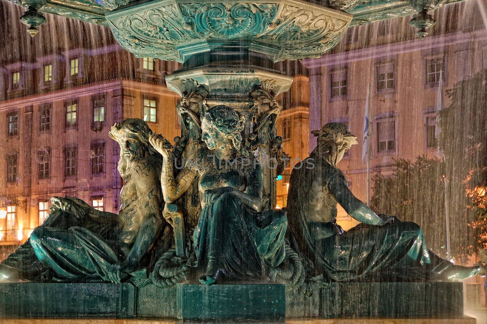 Fountain at Rossio Square in Lisbon, Portugal, night scene