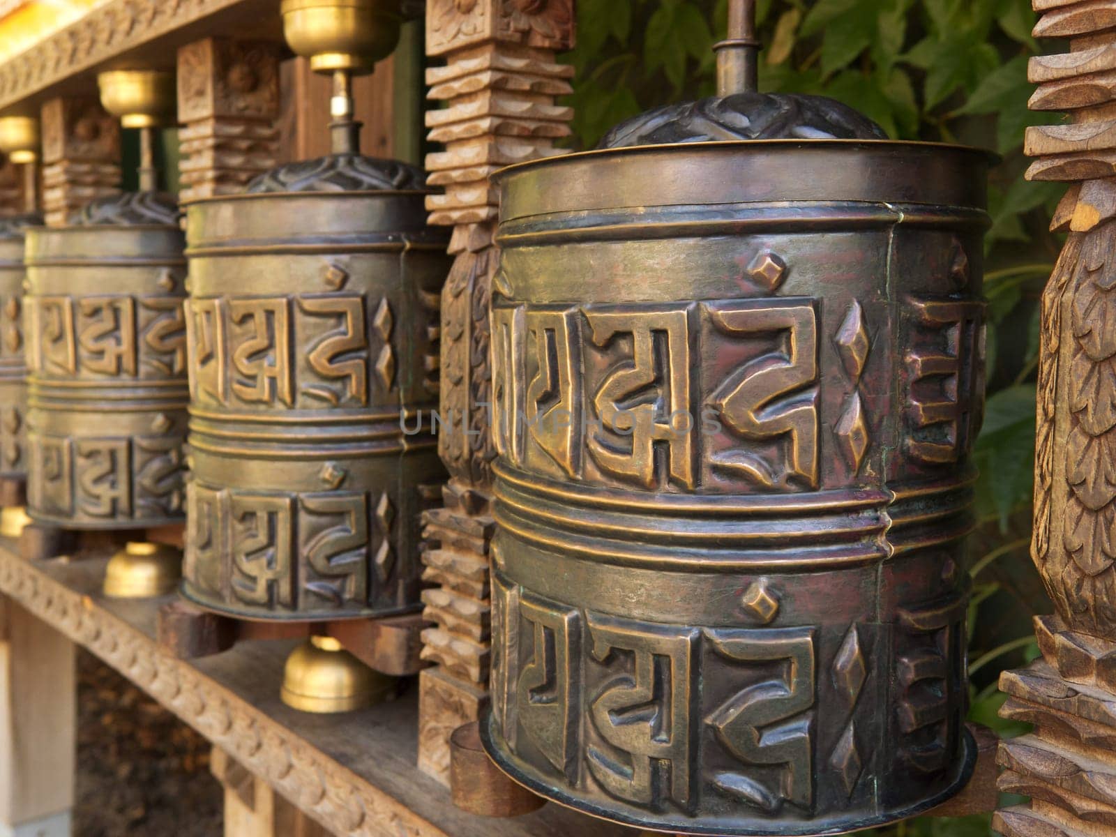 Tibetan prayer wheel,turning the roller with the right hand brings good karma