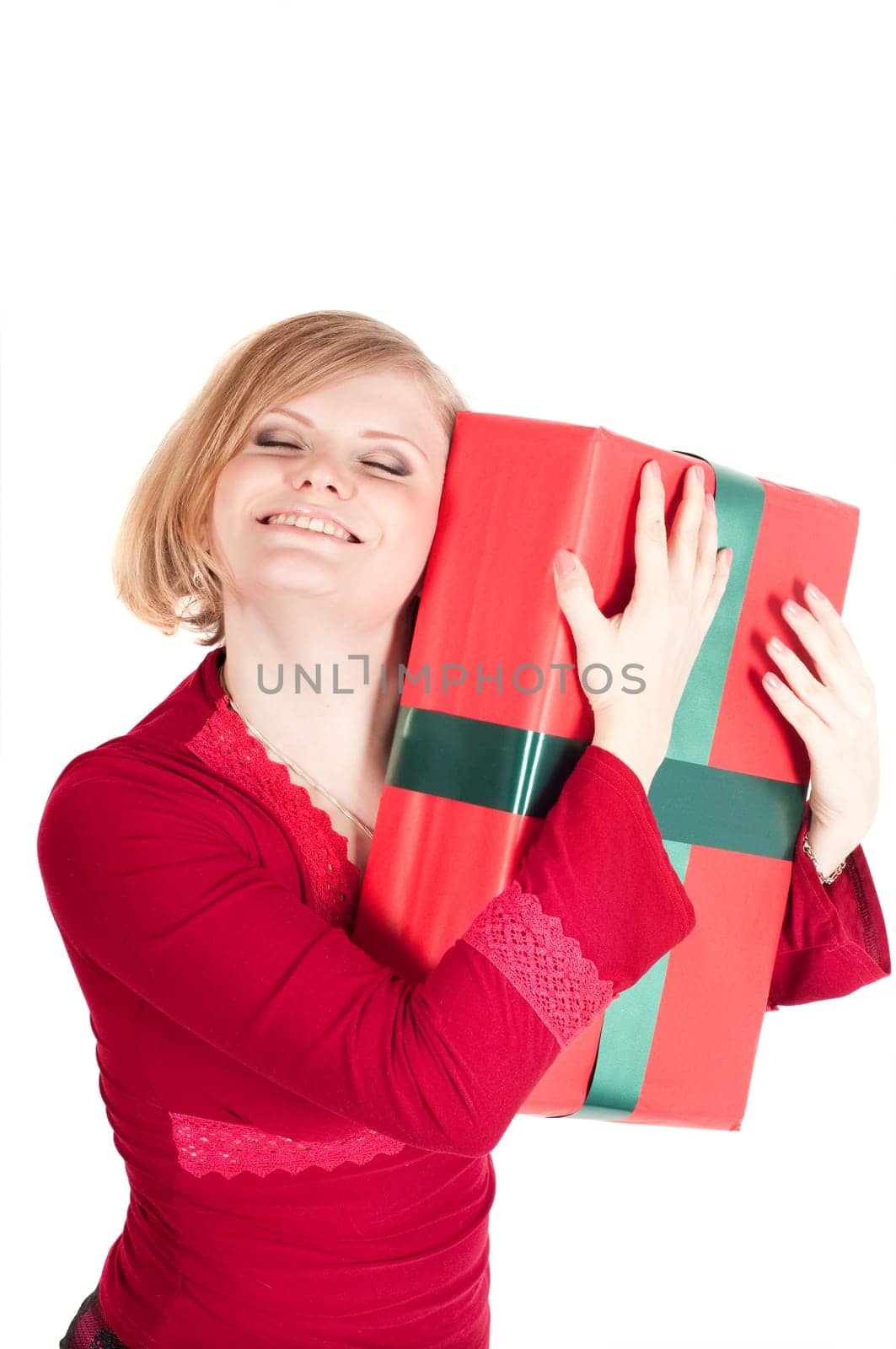 Happy woman with Christmas presents isolated on white