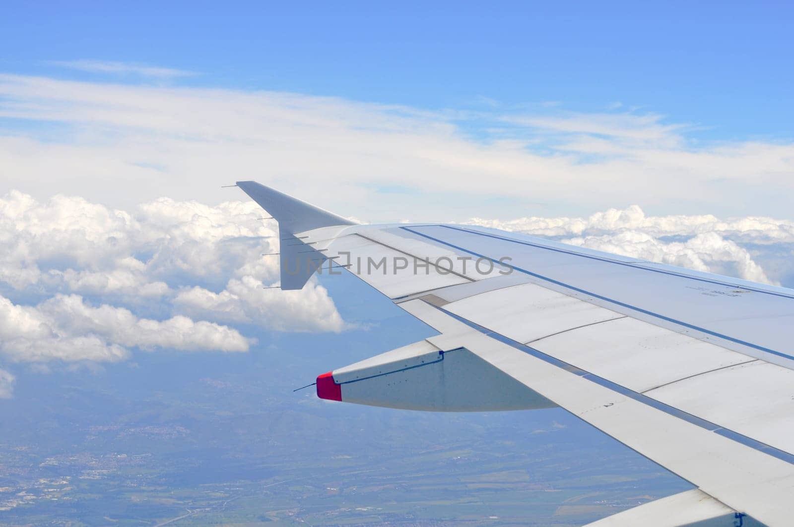 Aerial view from a flying plane in the sky